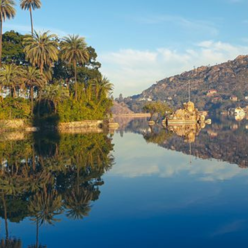 Scenic view of Nakki Lake in Mount Abu surrounded by unusual rock formations