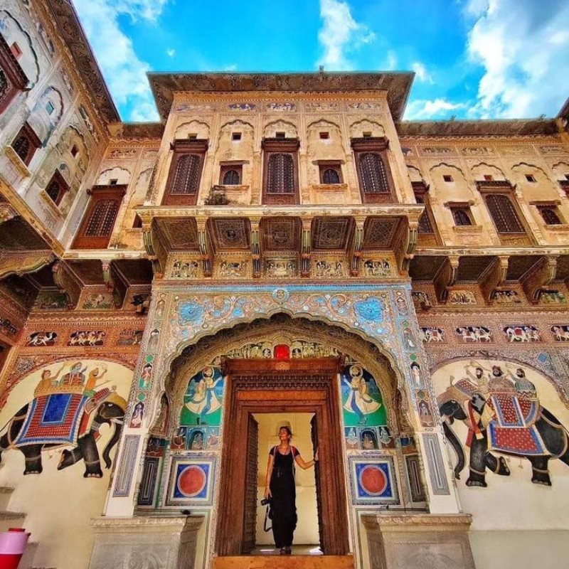 Intricate fresco paintings on the walls of ancient merchant mansions in Nawalgarh